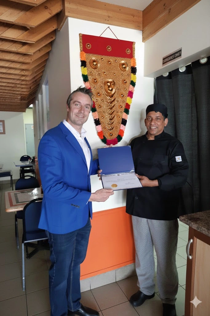 MC's Curry chef receiving culinary award for excellence in South Indian and Kerala cuisine